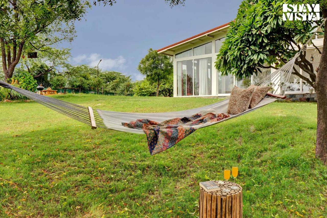 Stayvista's Glasshouse: Orchard Farmstay with Pool and Relaxation Gurgaon Exterior photo