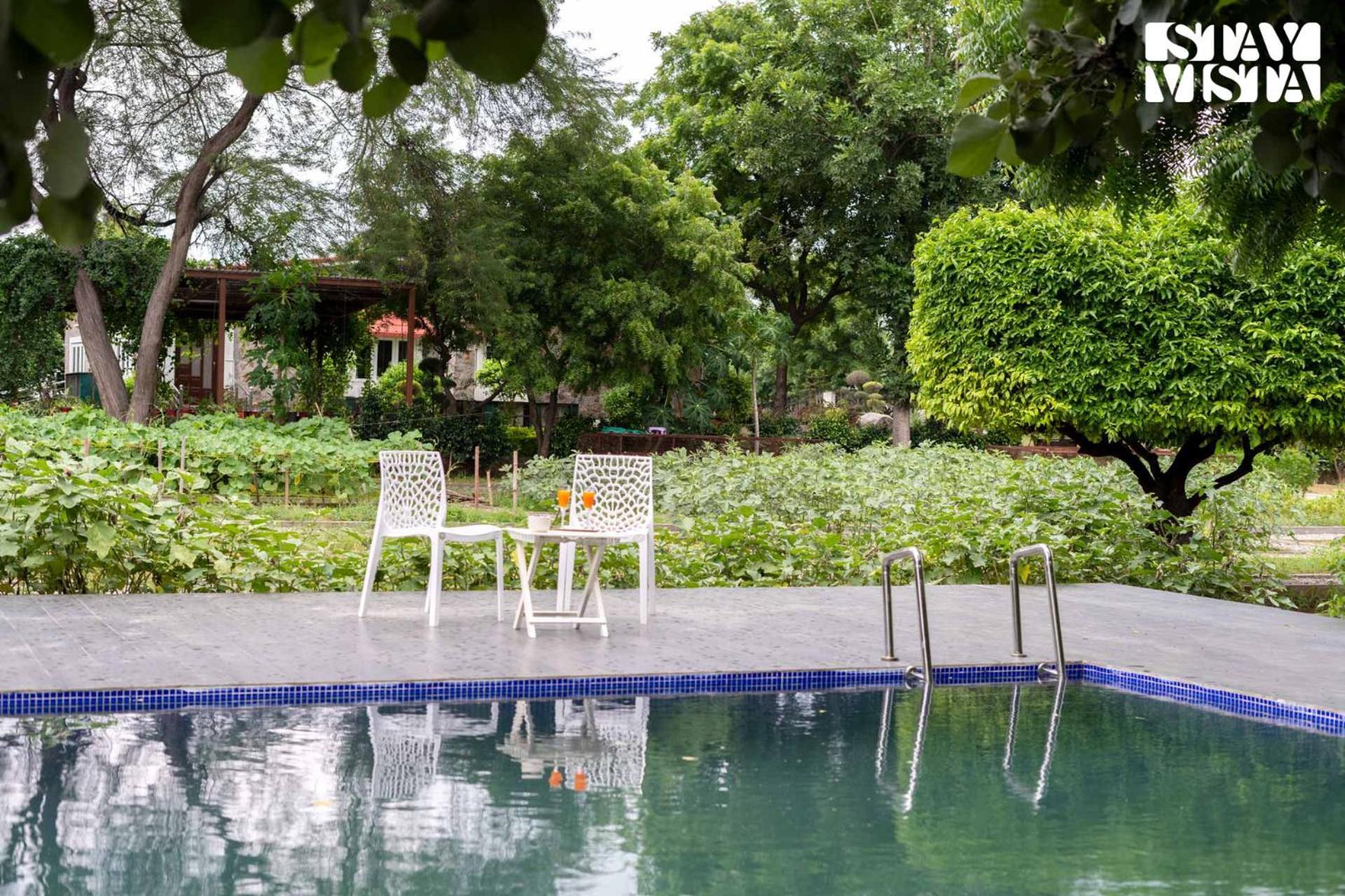 Stayvista's Glasshouse: Orchard Farmstay with Pool and Relaxation Gurgaon Exterior photo