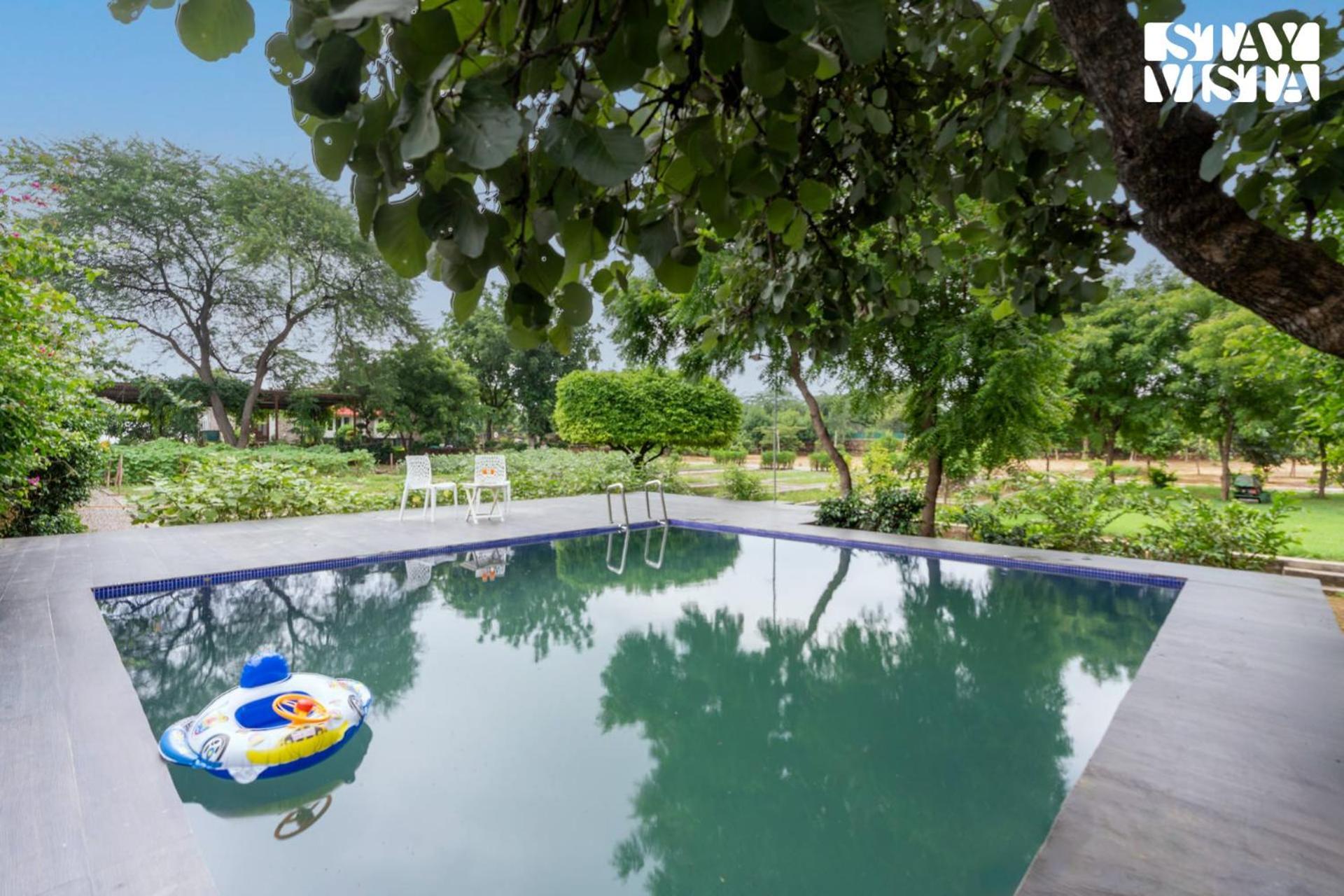 Stayvista's Glasshouse: Orchard Farmstay with Pool and Relaxation Gurgaon Exterior photo